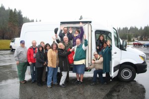 Caption:  Great Northern employees and Weed Rotary Club members celebrate the arrival of a new refrigerated van for the GNS Community Food Program.  A large donation to the Shasta Regional Community Fund Disaster Relief Program from an anonymous donor was designated for the purchase and supplemented by the Weed Rotary Club.